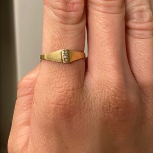 simple and dainty 14k yellow gold and diamond ring